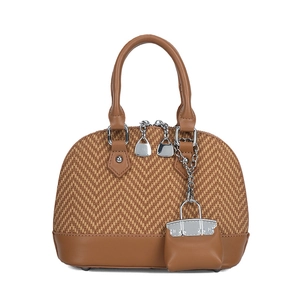 Brown chevron straw dome handbag with faux leather trim and mini bag charm detail