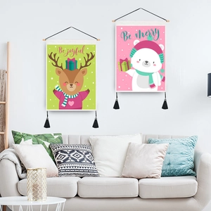 Set of two Christmas wall tapestries featuring reindeer and polar bear with black tassels