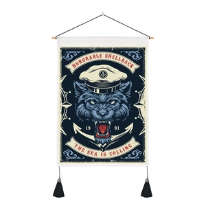 Detail of nautical wolf tapestry featuring a captain hat, anchor, and black tassels