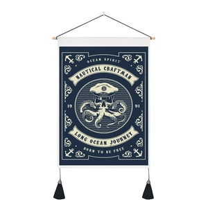 Detail of nautical tapestry with skull captain, anchor prints and black hanging tassels