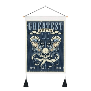 Detail of vintage nautical wall tapestry with skull, octopus tentacles and black tassels