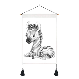 Detail of Nordic canvas art with baby zebra illustration, wood rod, and black tassels