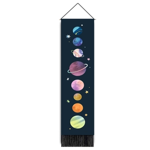 Vertical wall tapestry with colorful planets on deep blue background and black tassels
