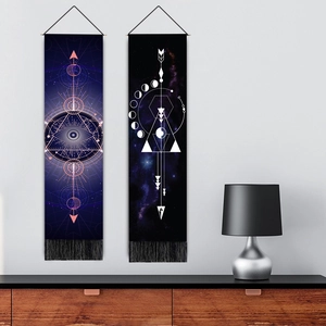 Vertical wall tapestries with moon phases and mystical eye design in modern living room