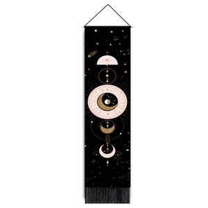 Detailed shot of black moon phase tapestry featuring golden stars and elegant black tassels