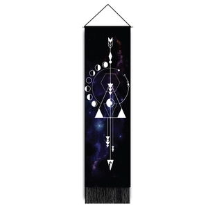 Detail of moon phase tapestry with nebula print, wooden pole, and black fringe tassels