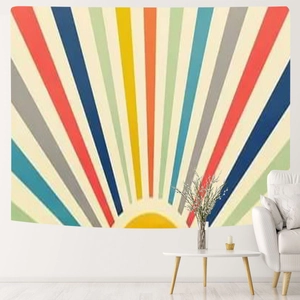 Retro rainbow sunburst tapestry in boho style hanging on a white living room wall