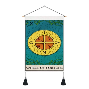 Detailed texture of Wheel of Fortune tarot tapestry with green vines and black tassels