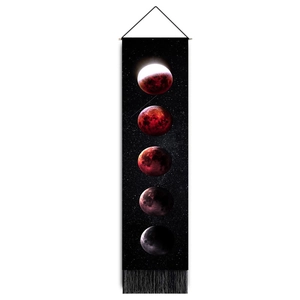 Detailed view of the phases of the moon wall tapestry with elegant black fringe tassels