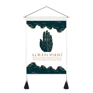 Detail of tarot wall tapestry with mystic hand and stars motif plus black tassels