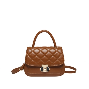 Elegant brown quilted crossbody bag with gold hardware and top handle for women