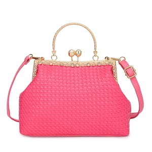 Pink woven shell handbag with pearl clasp, gold metal handle and floral rhinestone detail