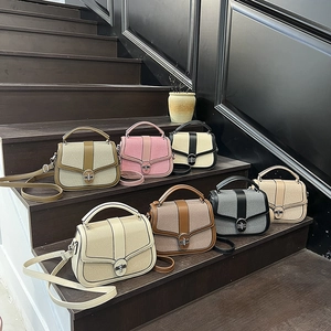 Modern large capacity patchwork handbags for women in 7 colors on wooden stairs