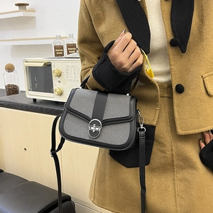 Retro grey woven texture handbag with black leather trim and silver circular twist lock