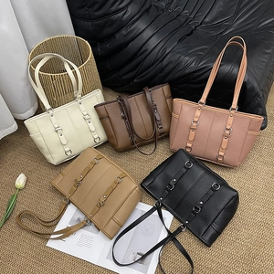 Large vintage tote bags in multiple colors with pebbled leather and long shoulder straps