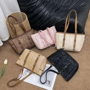 Vintage leather tote bags in five colors with retro matte finish and metal ring accents