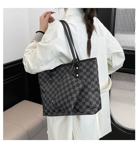 Macro shot of large vintage print tote bag and matching small pouch with checkered pattern