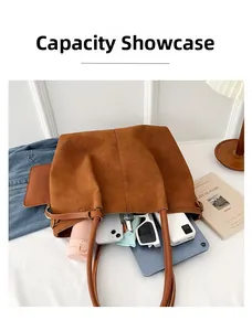 Large suede tote bag showing capacity for smartphone, tablet, and daily essentials