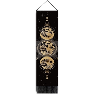 Vertical black fabric wall hanging with gold moon phases and tassels for home decor