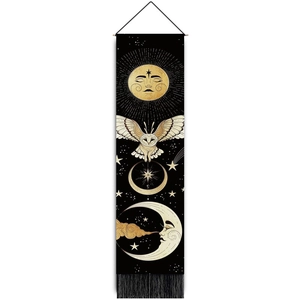 Detailed shot of mystic owl and moon wall tapestry with bottom fringe and wooden rod