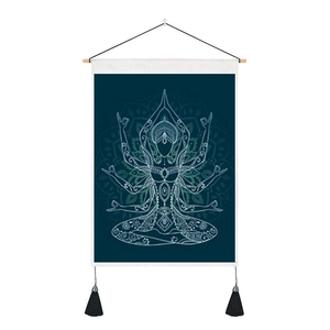 Detail of meditation figure and mandala pattern on navy cotton linen wall tapestry