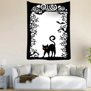Bohemian Halloween wall tapestry with black cat and bat design over a white sofa