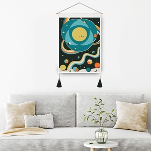 Minimalist celestial tapestry with geometric moon sun art and tassel hanging on white wall