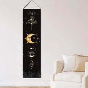 Bohemian moon eclipse wall tapestry with gold geometric sun and stars on black fabric