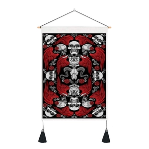 Gothic skull tapestry with red wings and roses on a black background with wood bar