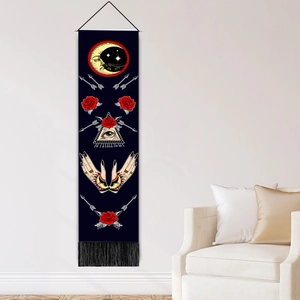 Celestial tapestry with sun moon and mystic eye pattern in minimalist room decor