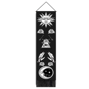 Bohemian sun and moon tapestry with black fringe and celestial mystical symbols