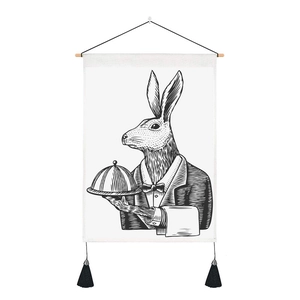 Detail of minimalist rabbit waiter sketch tapestry with wooden hanging rod and black tassels