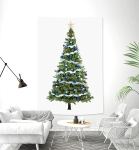 Detail of Christmas tree wall tapestry hanging above a modern living room sofa