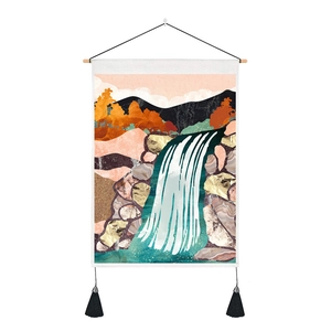 Detail of Nordic abstract landscape wall hanging with wooden pole and black tassels
