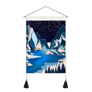 Detail of Nordic abstract landscape tapestry with blue mountains and black tassels
