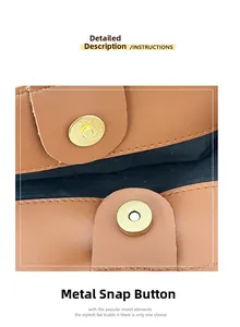 Close-up of the golden magnetic buckle and hardware detail on a brown leather tote bag
