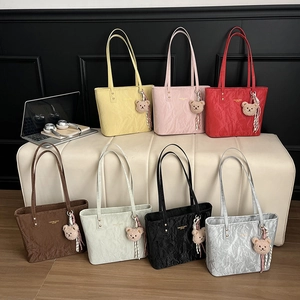 Retro pleated tote bags in seven colors with teddy bear charms and stylish straps