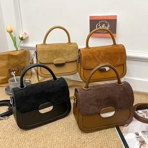 Chic 2025 saddle bags in suede and PU leather with metal buckle and shoulder strap