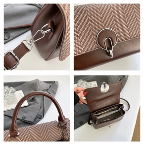 Detail view of the silver metal lock, leather handle, and herringbone tweed texture on the bag