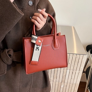Caramel embossed fashion tote bag with stylish letter ribbon and large capacity design
