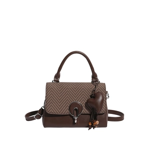 Retro brown contrast handbag with herringbone flap and heart pendant, versatile top-handle bag