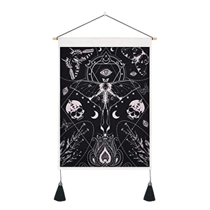 Bohemian moth wall tapestry with skull and crescent moon motifs and black tassels