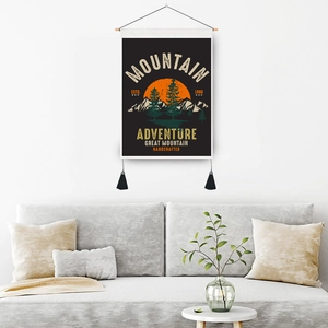 Mountain Adventure tapestry with snowy peak and orange sunset over green pine forest
