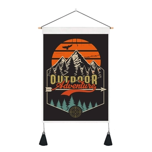 Detail of outdoor adventure wall scroll with wooden pole, black rope and twin tassels