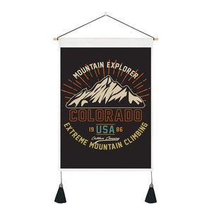 Minimalist mountain explorer wall art canvas with wood frame and decorative tassels