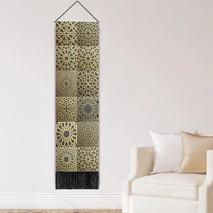Modern vertical wall tapestry with gold geometric Arabic patterns and black tassels
