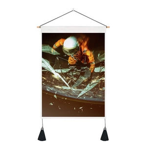 Detail of sci-fi astronaut wall tapestry with wooden hanger and black decorative tassels