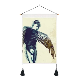 Artistic wall tapestry with female portrait featuring wings and black tassels