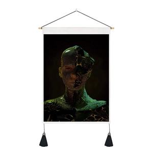 Close-up of Nordic tapestry showing 3D sci-fi female portrait with black tassels