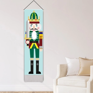 Classic Nutcracker soldier Christmas wall hanging with blue background and bottom tassels